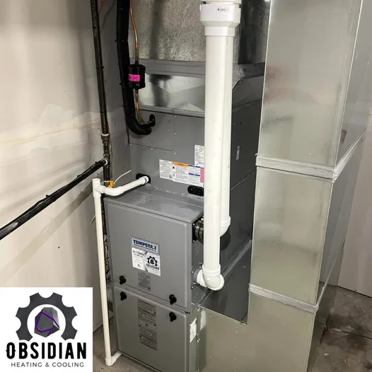 Newly installed Tempstar high-efficiency furnace with PVC venting