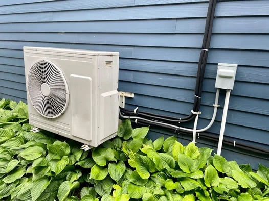 Residential ductless mini-split outdoor unit maintained by Obsidian Heating & Cooling