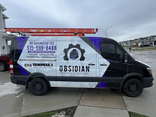 Obsidian service van parked at a residential driveway in Ankeny, IA